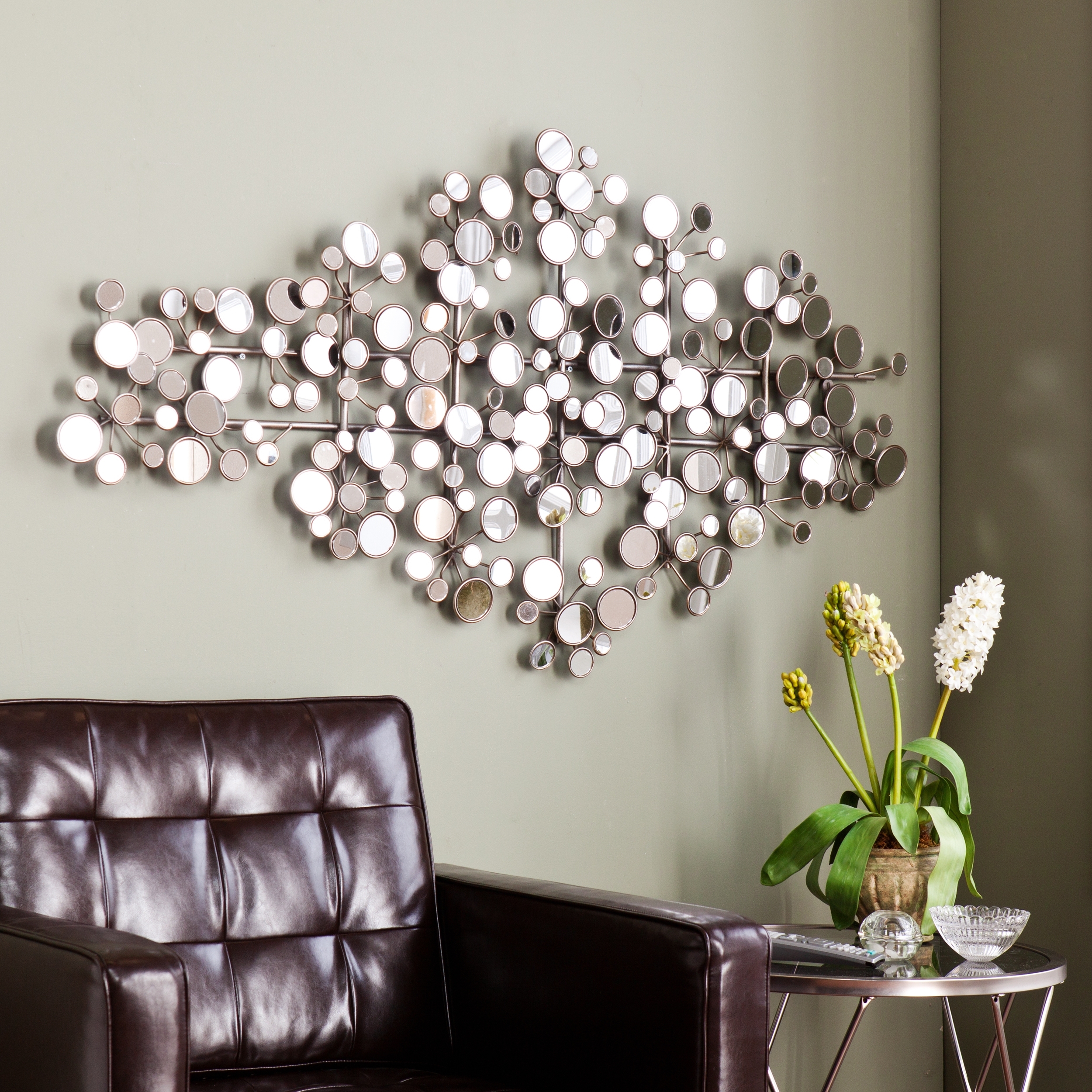 Recent This Upton Home Olivia Mirrored Metal Wall Sculpture Features A Within Modern Mirrored Wall Art (View 12 of 15)