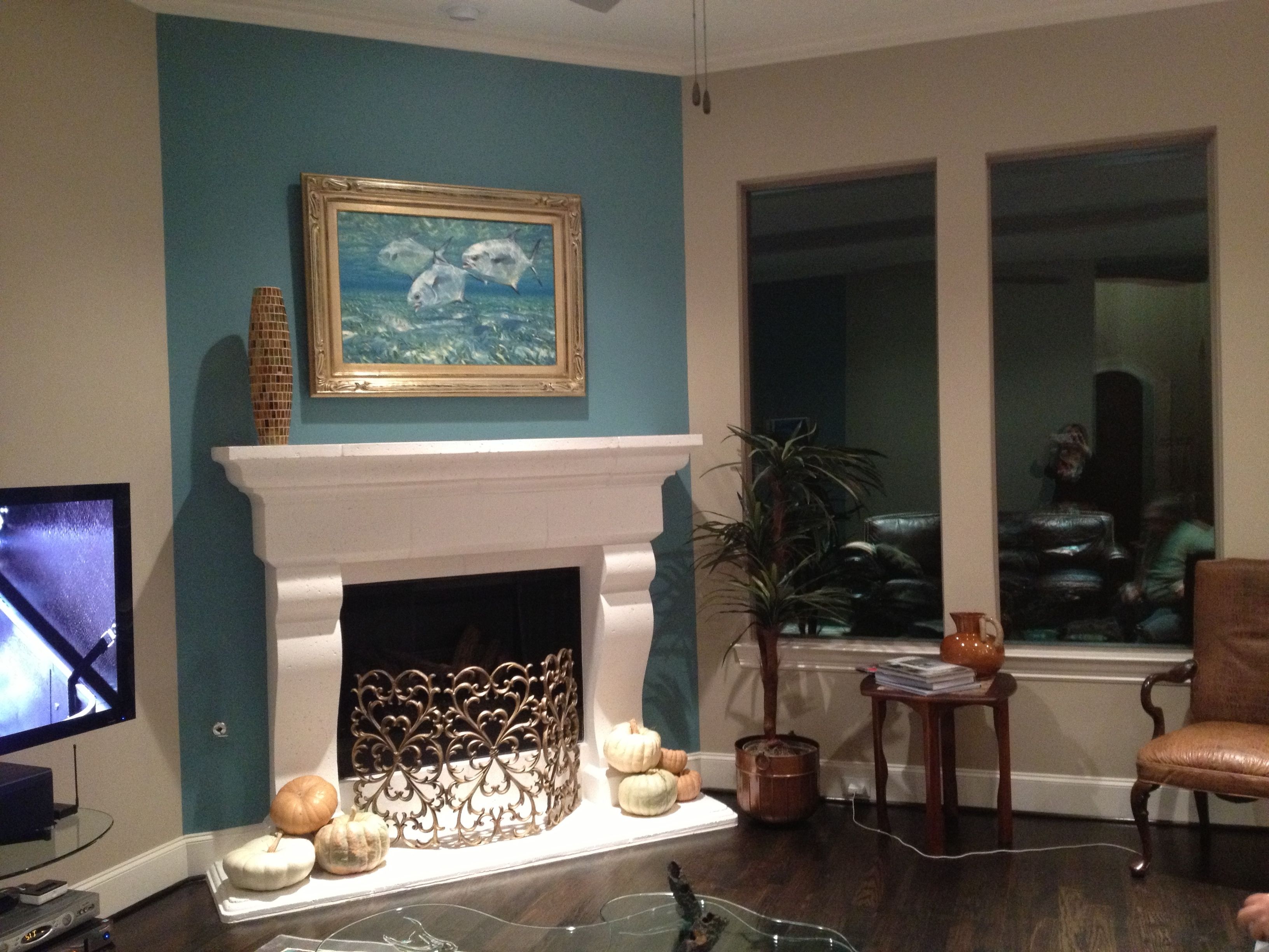 Fireplace Accent Wall Complements Painting (View 1 of 15)