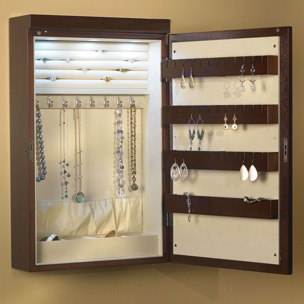 The 24" Wall Mounted Illuminated Jewelry Armoire In Newest Jewelry Armoire Wall Mirrors (View 13 of 20)