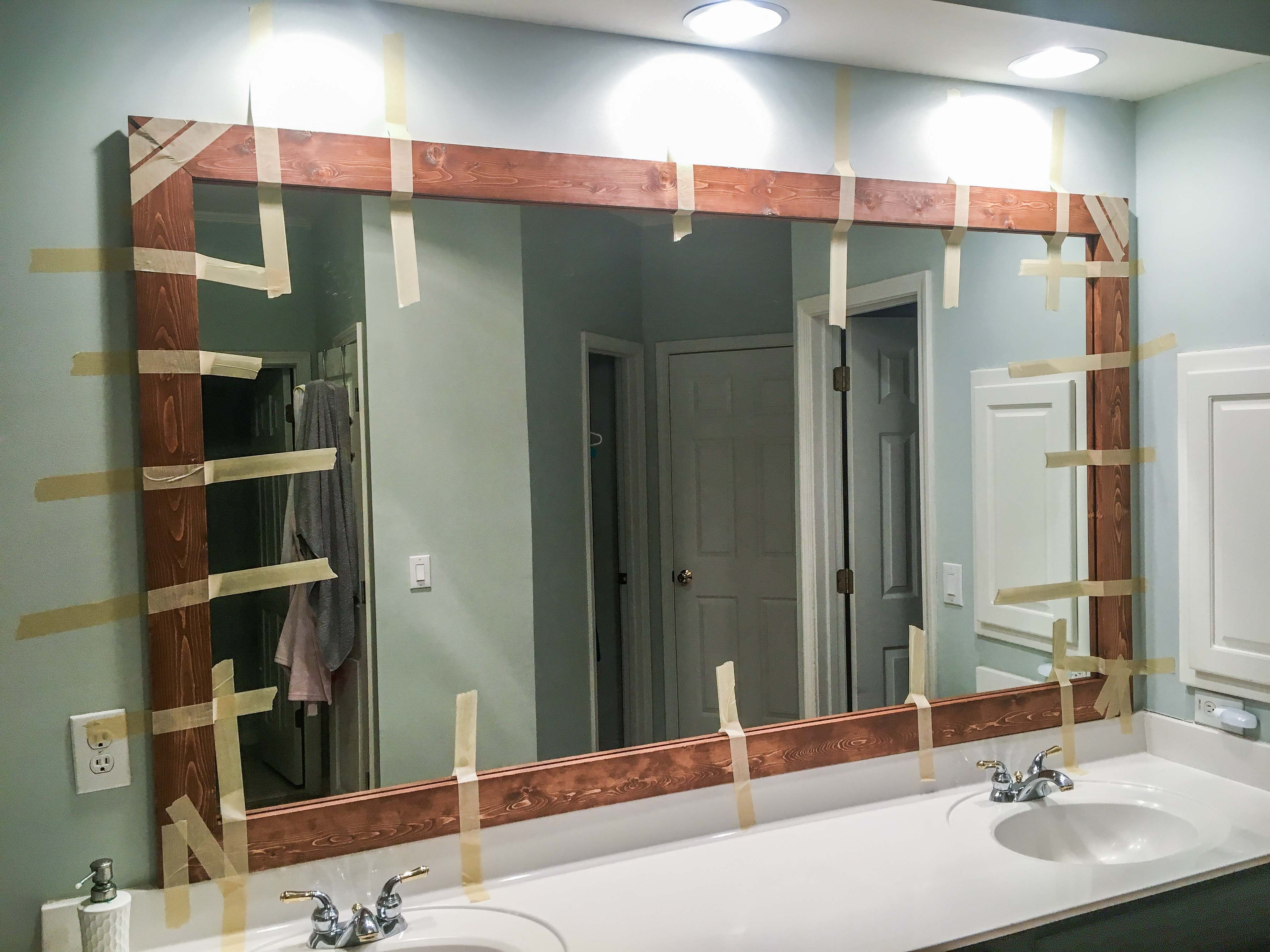 Well Known Framing Bathroom Wall Mirrors Regarding How To Diy Upgrade Your Bathroom Mirror With A Stained Wood Frame (View 13 of 20)