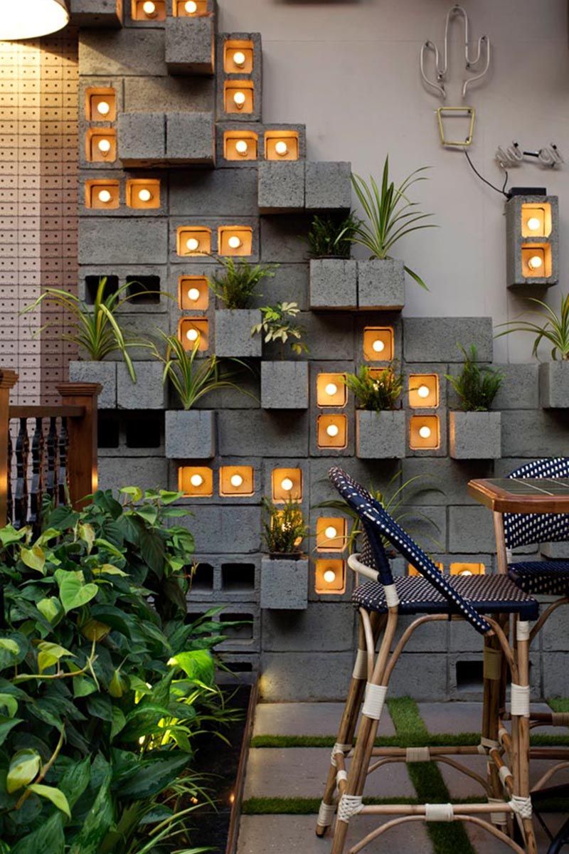 A Concrete Block Planter Wall Was Used To Add Greenery To With Regard To Trendy Concrete Wall Art (View 16 of 20)