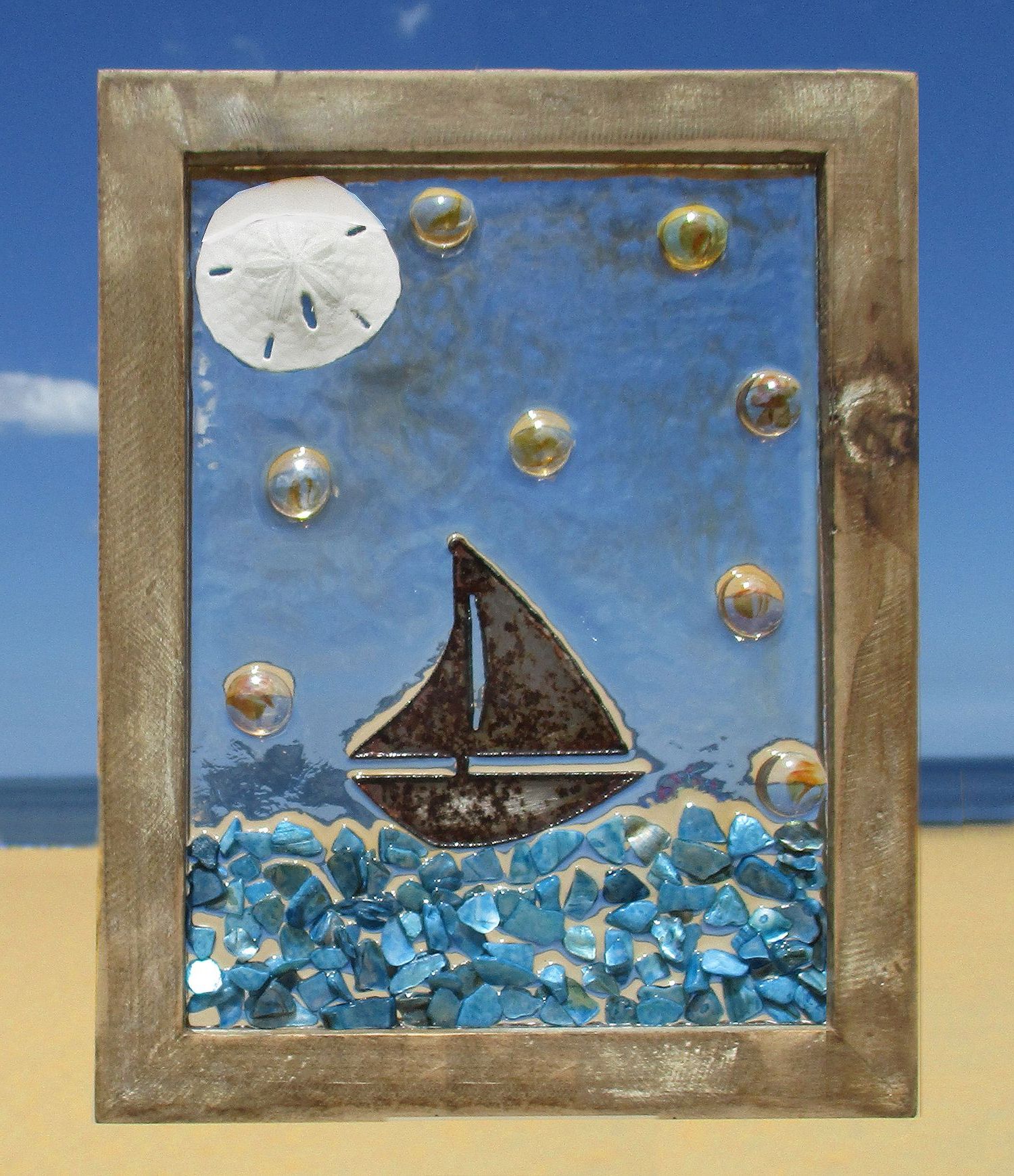 Most Up To Date Rusty Scrap Metal Sailboat In An Ocean Of Blue Abalone Shells, With An Intended For Sand And Sea Metal Wall Art (View 11 of 15)