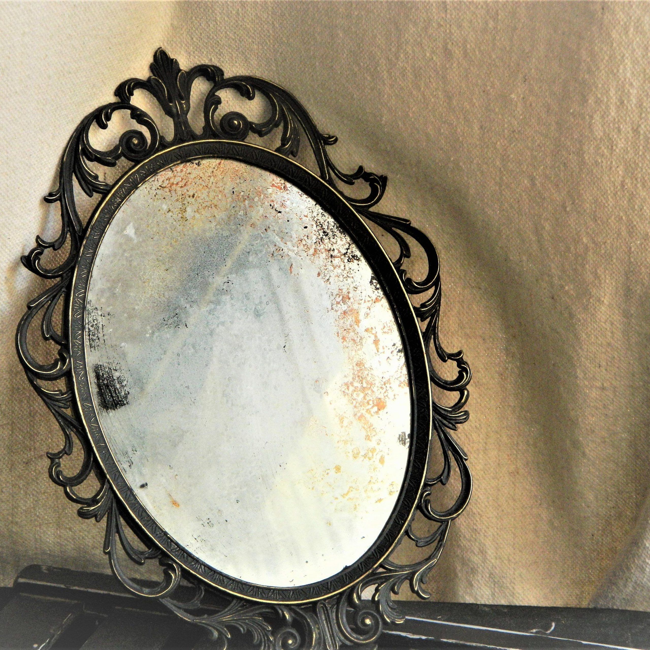 Ornate Distressed Black Frame Oval Antiqued Wall Mirror (View 6 of 15)